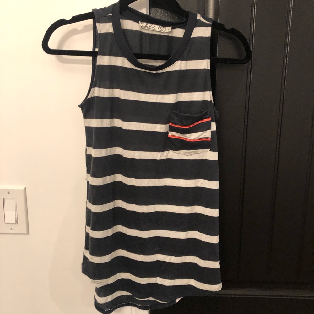 Cute tank top. Extremely soft.